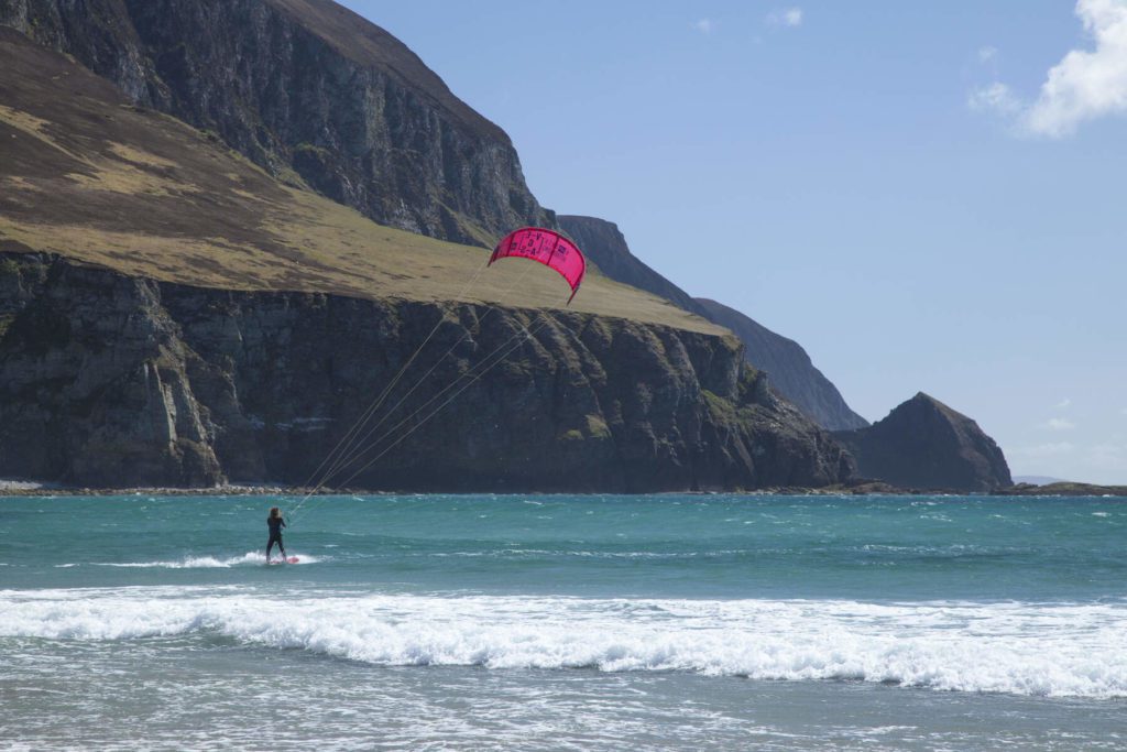 Kitesurfing beneath Minaun Cliffs, Achill Island, County Mayo, Ireland.